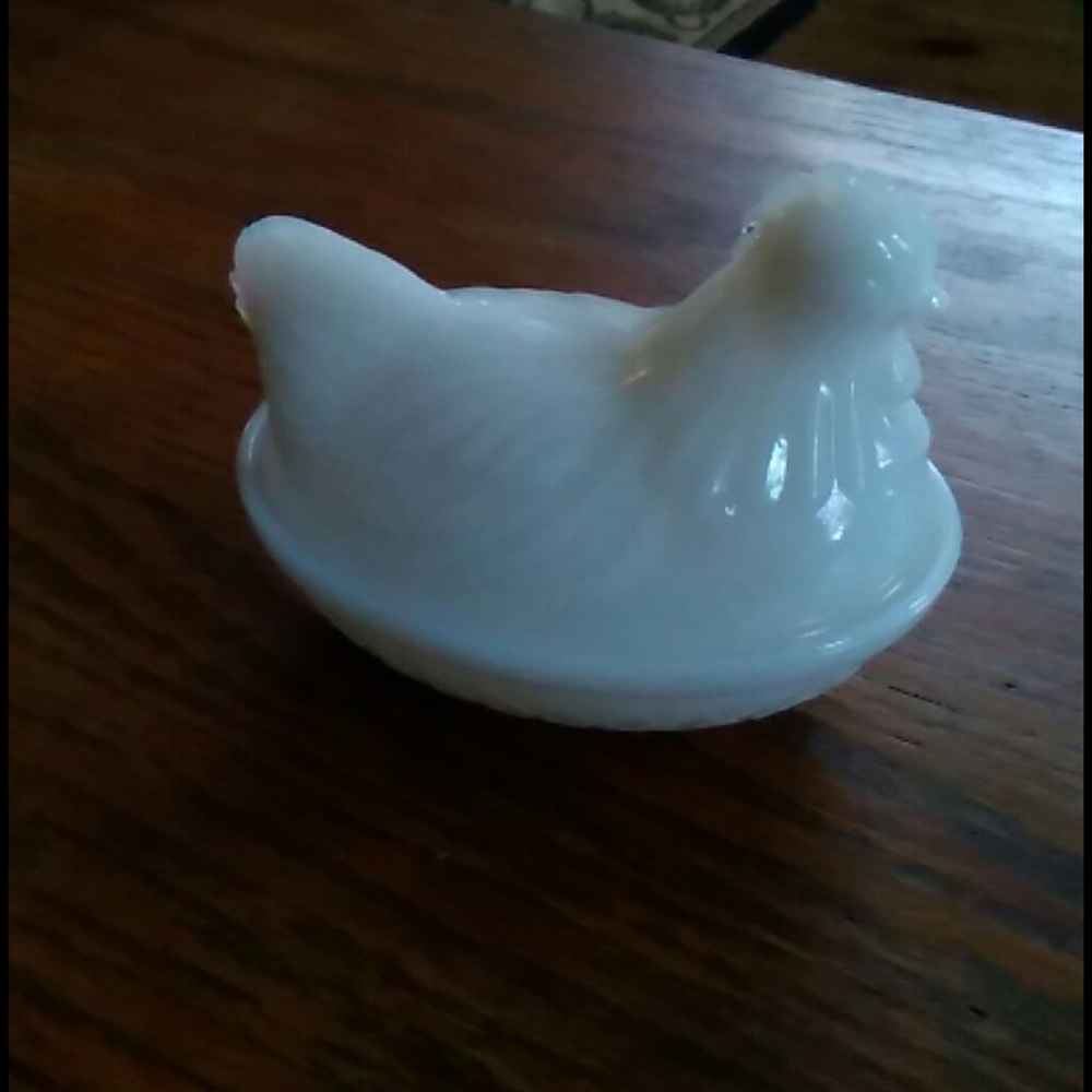 Vintage white hen on basket